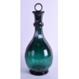 AN 18TH/19TH CENTURY CONTINENTAL GREEN GLASS BOTTLE with facetted base. 28 cm high.