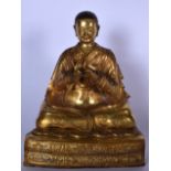 A LARGE CHINESE SINO TIBETAN GILT BRONZE BUDDHA OR STATUE, formed as Lama seated with hands together