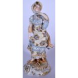 AN EARLY 20TH CENTURY EUROPEAN PORCELAIN FIGURINE OR STATUE IN THE FORM OF A STANDING FEMALE, modell