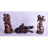 A 19TH CENTURY CHINESE CARVED ROOTWOOD FIGURE OF A BUFFALO Qing, together with two hardwood figures