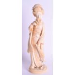 A 19TH CENTURY JAPANESE MEIJI PERIOD CARVED IVORY BIJIN BEAUTY modelled smelling a flower. 21.5 cm h