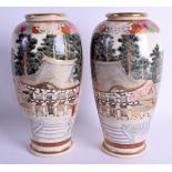 A PAIR OF EARLY 20TH CENTURY JAPANESE TAISHO PERIOD SATSUMA VASES painted with pagodas within trees.