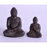 A 19TH CENTURY JAPANESE MEIJI PERIOD MINIATURE BRONZE BUDDHA together with a similar smaller buddha.