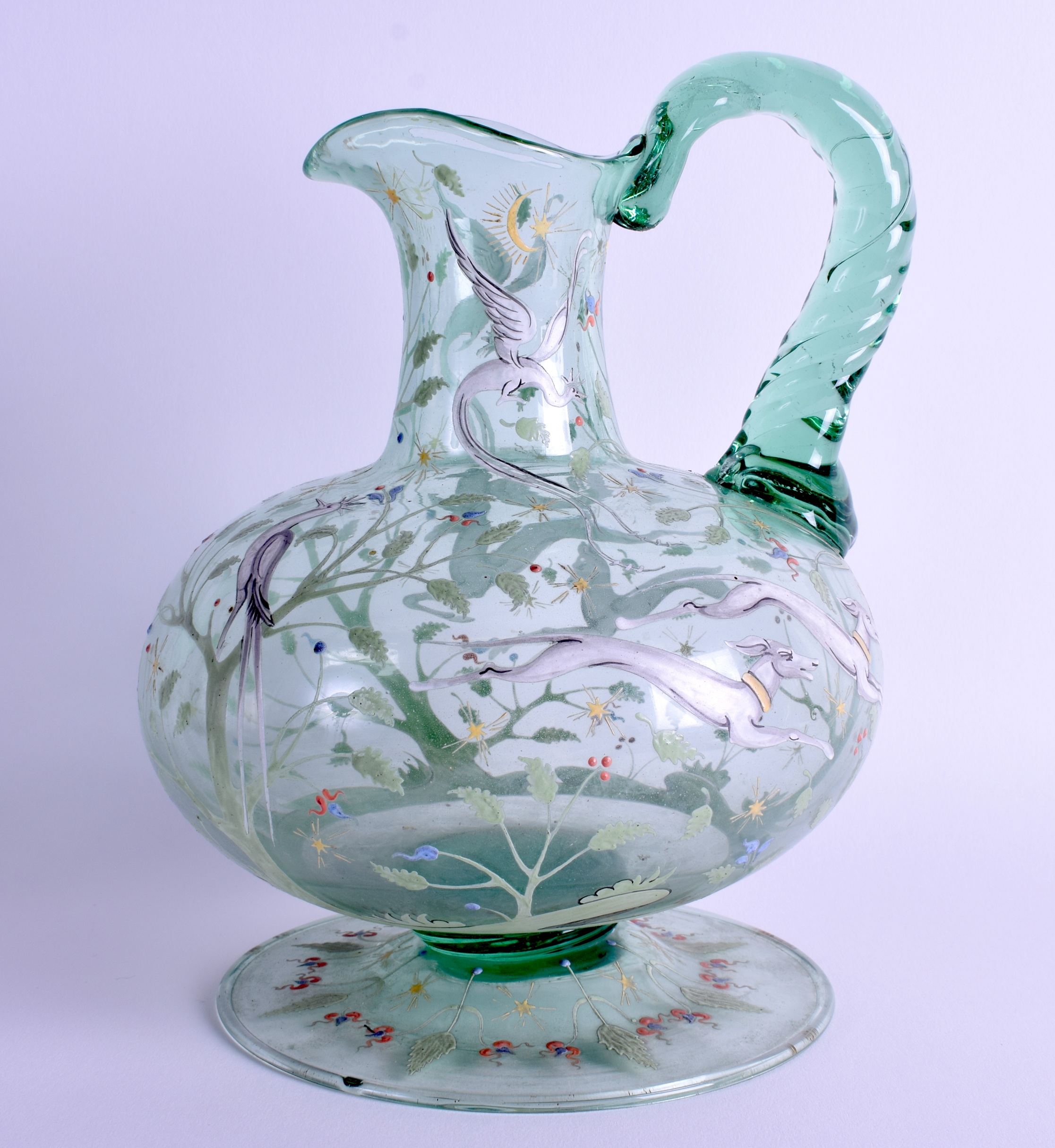 AN ART NOUVEAU GERMAN ENAMELLED GLASS PITCHER C1890 Attributed to Fritz Heckert, enamelled in the Is