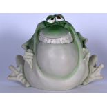 A LARGE AMUSING COIN BANK OR MONEY BOX IN THE FORM OF A FROG, formed with an exaggerated belly. 19 c