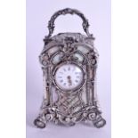 A LOVELY LATE 19TH CENTURY FRENCH SILVER MINIATURE CLOCK with foliate embellished case and mother of