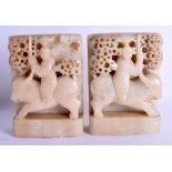 A PAIR OF 19TH CENTURY CHINESE CARVED SOAPSTONE BOOKENDS Late Qing. 19 cm x 12 cm.