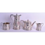 A GOOD VICTORIAN SILVER PLATED FOUR PIECE TEASET decorated with scrolling foliage. Largest 26 cm x 1