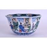 A 19TH CENTURY CHINESE WUCAI OCTAGONAL PORCELAIN BOWL bearing Kangxi marks to base, painted with fig