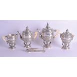 A GOOD 19TH CENTURY SOUTH EAST ASIAN SILVER FOUR PIECE TEASET decorated with buddhistic goads and ex