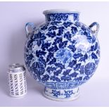 AN UNUSUAL MID 19TH CENTURY CHINESE BLUE AND WHITE TWIN HANDLED VASE Qing, painted with flowers and