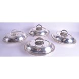 A SET OF FOUR 19TH CENTURY SILVER PLATED TUREENS AND COVERS with bead work banding. 35 cm x 22 cm. (