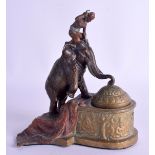 A RARE 19TH CENTURY AUSTRIAN BERGMANN COLD PAINTED INKWELL in the form of a an Arabic male riding up