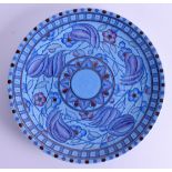 AN ART DECO CROWN DUCAL PURPLE CHARGER by Charlotte Rhead. 32 cm diameter.