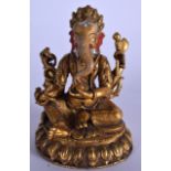 A CHINESE GILT BRONZE STATUE OR BUDDHA IN THE FORM OF GANESHA, modelled seated upon a beaded lotus t