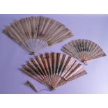THREE 19TH CENTURY FRENCH MOTHER OF PEARL SILK AND LACE FANS in various forms and sizes. Largest 65