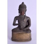 A 19TH CENTURY SOUTH EAST ASIAN BRONZE BUDDHA modelled with hands clasped, bearing red pigment trace