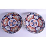 A LARGE PAIR OF 19TH CENTURY JAPANESE MEIJI PERIOD SCALLOPED DISHES painted with birds and foliage.
