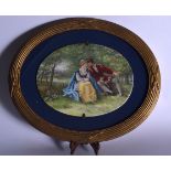 AN EARLY 20TH CENTURY GERMAN PORCELAIN PLAQUE OR PANEL, decorated with two lovers in a landscape, mo
