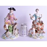 A LARGE PAIR OF 18TH CENTURY CHELSEA DERBY PORCELAIN FIGURES OF A MALE AND FEMALE modelled seated up