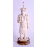 AN UNUSUAL 19TH CENTURY INDIAN CARVED AND PAINTED IVORY FIGURE modelled holding a spear. Ivory 14 cm