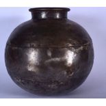 A LARGE METAL STORAGE POT OR VASE, formed with hammered panels. 48 cm wide.