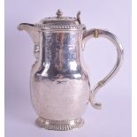 AN EDWARDIAN BRITANNIA STANDARD HAMMERED SILVER JUG by Henry Bourne. London 1901. 19 oz. 19 cm high.