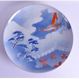 A 19TH CENTURY JAPANESE MEIJI PERIOD CARP DISH painted with swimming fish within landscapes. 35 cm d