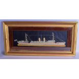 A 19TH CENTURY MARITIME EMBROIDERED SAMPLER depicting HMS China. Image 53 cm x 14 cm.