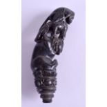 A 19TH CENTURY CEYLON BURMESE CARVED HORN WALKING CANE HANDLE decorated with a buddhistic figure bei