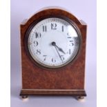 AN ANTIQUE CARVED IVORY AND WALNUT MANTEL CLOCK with circular enamel dial. 18 cm x 12 cm.