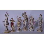 A GROUP OF SIX EUROPEAN PORCELAIN FIGURINES, all in the form if standing females. Largest 17 cm. (6)