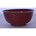 A CHINESE SANG DE BOUEF PORCELAIN BOWL, formed with a flared rim. 19.5 cm wide.