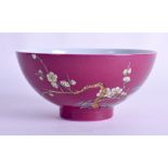 A GOOD EARLY 20TH CENTURY CHINESE RUBY GROUND PORCELAIN BOWL bearing Qianlong marks to base, painted