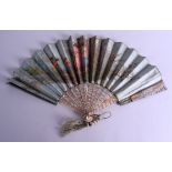 A MID 19TH CENTURY FRENCH CARVED MOTHER OF PEARL AND SILK FAN painted with figures swimming. 40 cm w