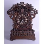 A LARGE LATE 19TH CENTURY BAVARIAN BLACK FOREST CUCKOO CLOCK decorated with acorn leaves and overlai