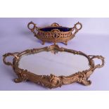 A LARGE 19TH CENTURY FRENCH GILT SPELTER MIRRORED TRAY together with a smaller classical dish. 50 cm