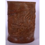 AN EARLY 20TH CENTURY CHINESE BAMBOO BRUSH POT OR BITONG, carved with fruiting vines. 16.5 cm high.