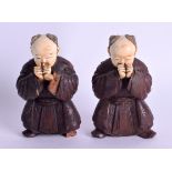 A PAIR OF 19TH CENTURY JAPANESE MEIJI PERIOD CARVED IVORY AND BOXWOOD FIGURES modelled in foliate en