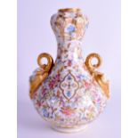 A 19TH CENTURY ISLAMIC STYLE CROWN DERBY TWIN HANELED VASE painted with stylised flowers. 22 cm high