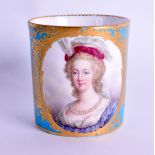 AN 18TH CENTURY SEVRES STYLE MUG painted with an elegant lady within gilt scrolls 7.5 cm high.