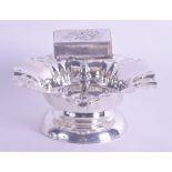 AN UNUSUAL ANTIQUE CONTINENTAL WHITE METAL ASHTRAY with attached swivel match case, decorated with p