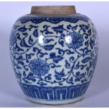 A 20TH CENTURY CHINESE BLUE AND WHITE PORCELAIN JAR, decorated with scrolling foliage. 20 cm high.