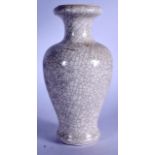 A CHINESE GE TYPE PORCELAIN VASE, baluster in shape with a flared rim. 21.5 cm high.