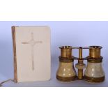 A 19TH CENTURY PAIR OF IVORY AND BRONZE BINOCULARS, together with a "The Book Of Common Prayer", for