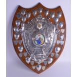 A LARGE ENGLISH SILVER AND ENAMEL HUDDERSFIELD DISTRICT SHIELD TROPHY set with an enamel portrait of