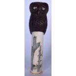 AN UNUSUAL GERMAN CARVED HARDWOOD OWL SCROLL HOLDER, formed with a bone body, engraved with two