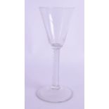 AN 18TH CENTURY ENGLISH WINE GLASS with spiral twist stem. 17.5 cm high.