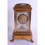 AN UNUSUAL LATE 19TH CENTURY FRENCH MUSICAL WIND UP CARRIAGE CLOCK decorated with mask heads. 28 cm