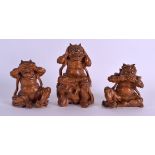 A FINE SET OF THREE 19TH CENTURY JAPANESE MEIJI PERIOD BOXWOOD OKIMONO depicting the three wise oni,